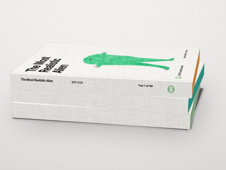 Imagined: Three volumes of the book design stacked; the top spine reads The Most Realistic Alien, 2027–2126, Year 1 of 100